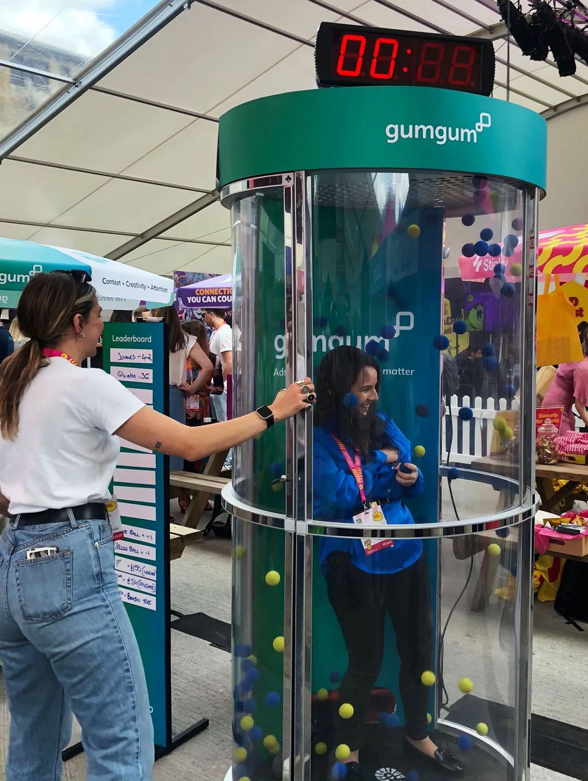 Enjoying games at a GumGum events booth managed by The Digital Voice