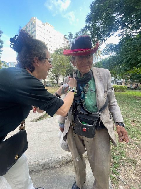 Priscila Teixeira styling homeless in Havana Cuba
