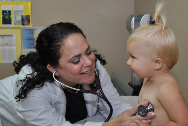 Happy Doctor with Baby.