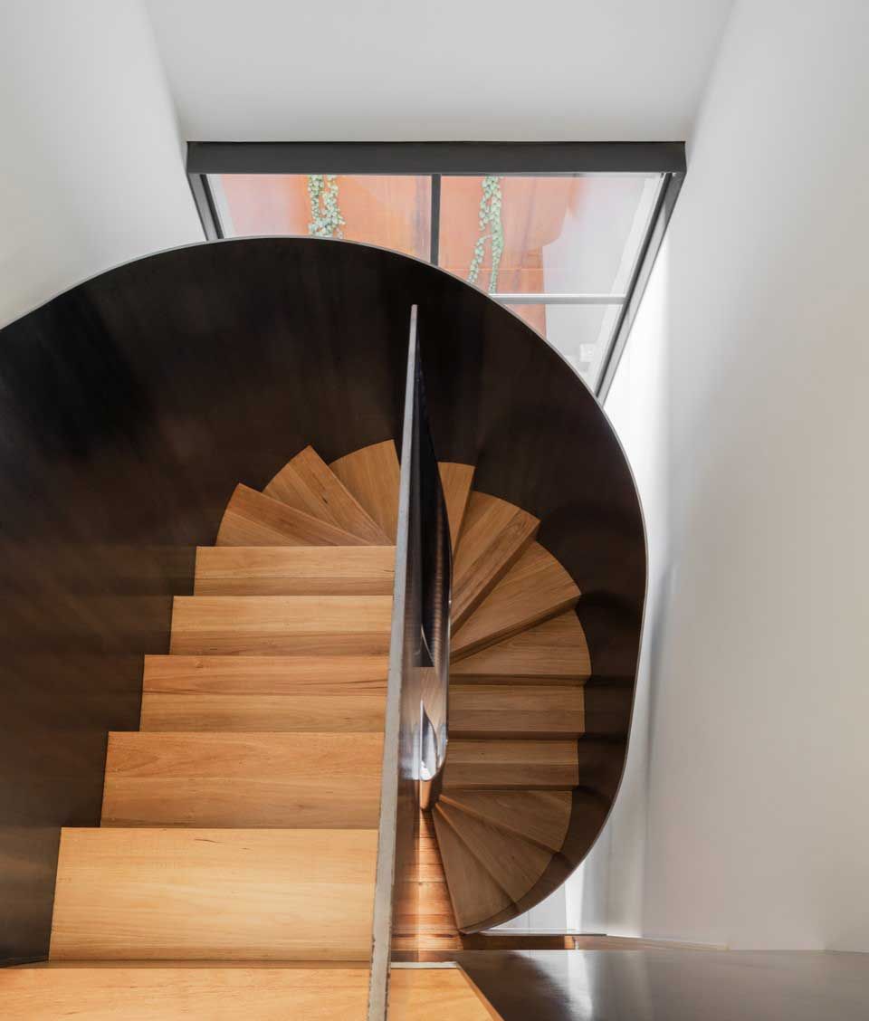 Bluesteel Spiral Stairway With Plate Balustrade and Clearcoat Finish Project