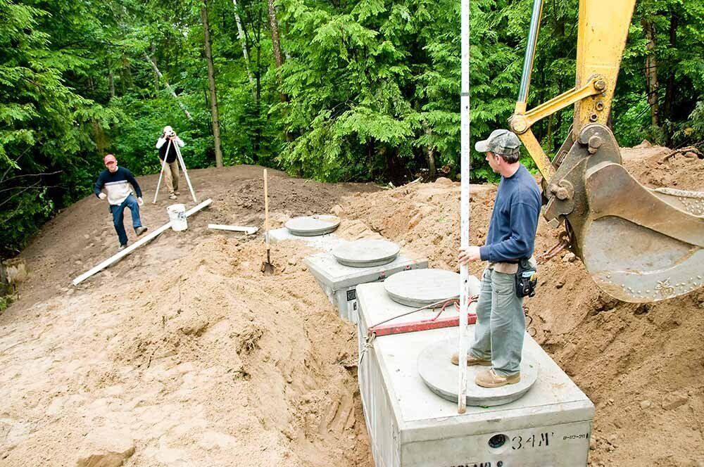 Workers On The Septic Tank — Carlisle, PA — Elwood B. Shughart & Sons Excavating