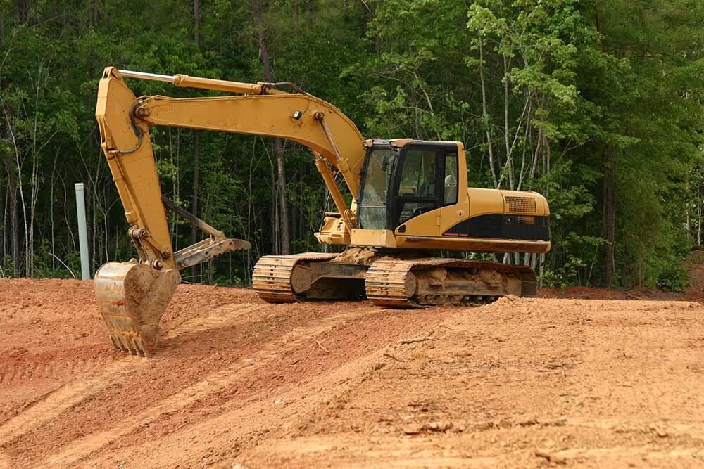 Excavator Clearing The Land — Carlisle, PA — Elwood B. Shughart & Sons Excavating