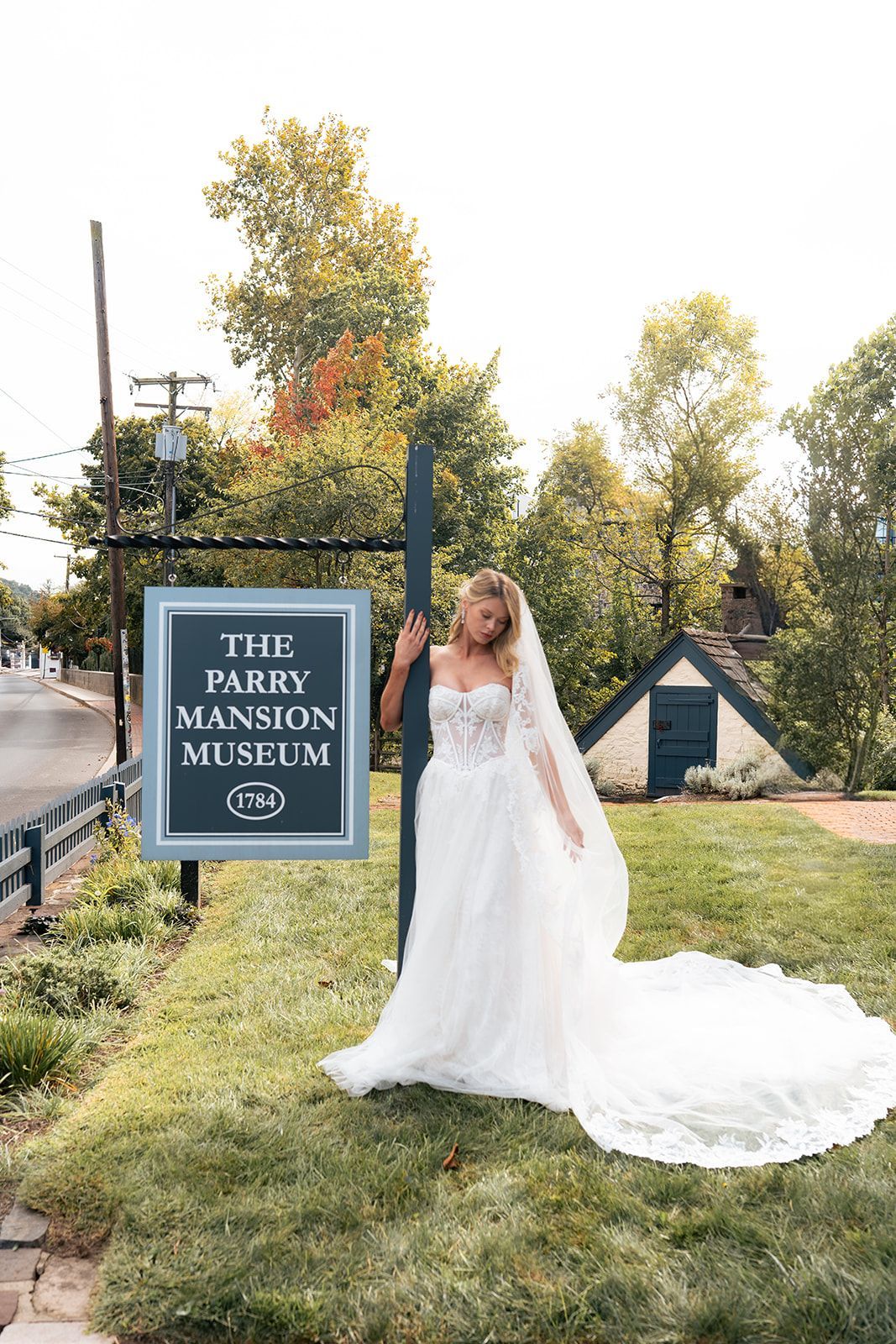 Image of a bride with the Parry Mansion sign