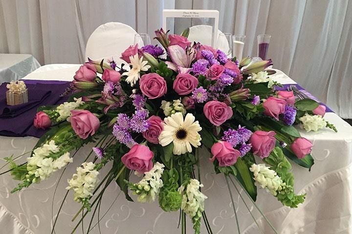 FLORERÍA KARLA-Arreglos florales para todo tipo de eventos sociales y ramos de novia