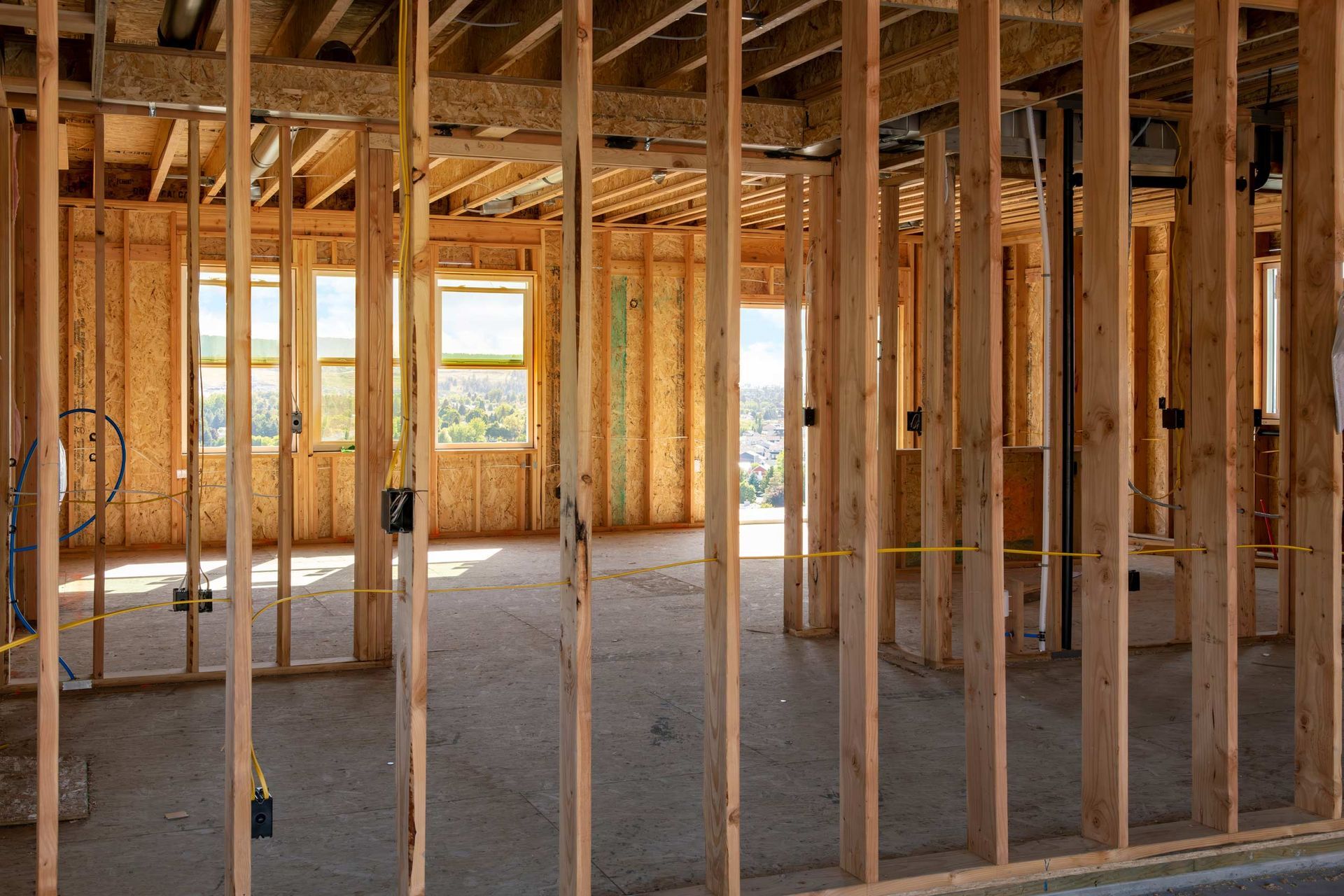 A framed new construction home being built.