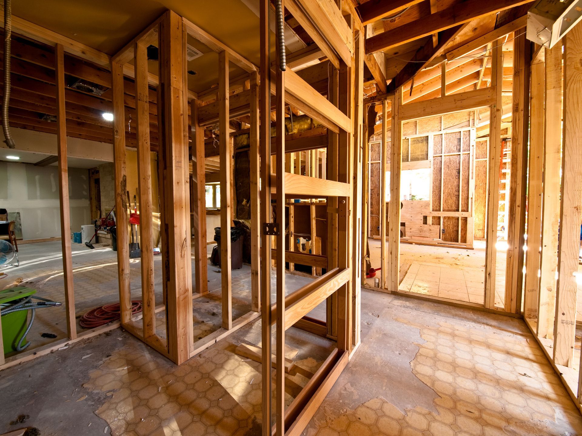 Interior of a house under construction, showing wood structures.
