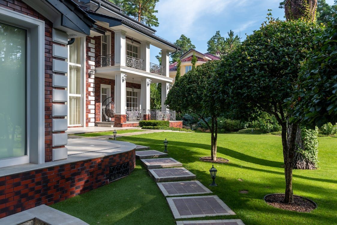 House with a brick facade and balcony House with a brick facade and balcony