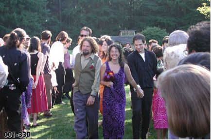 Deborah and Frank laughing together in the woods