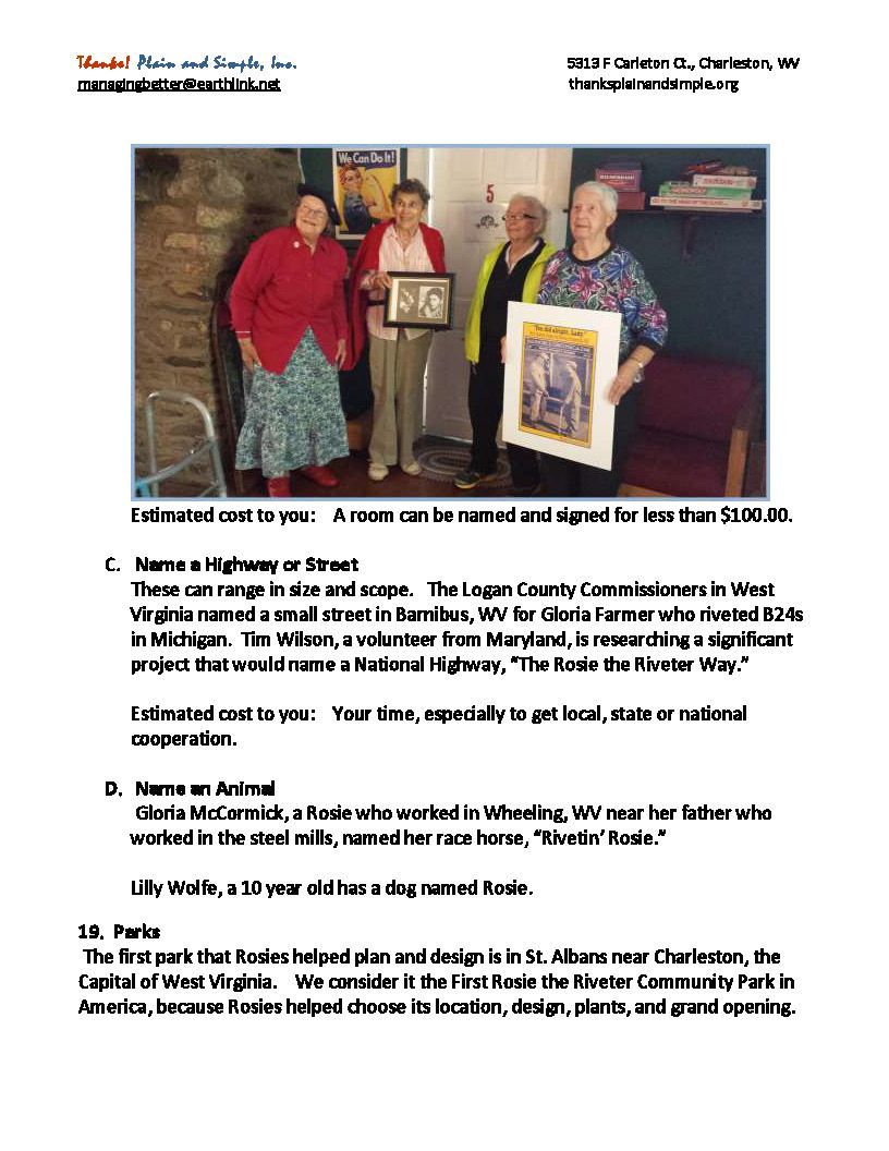 A group of people standing next to each other holding a framed picture.