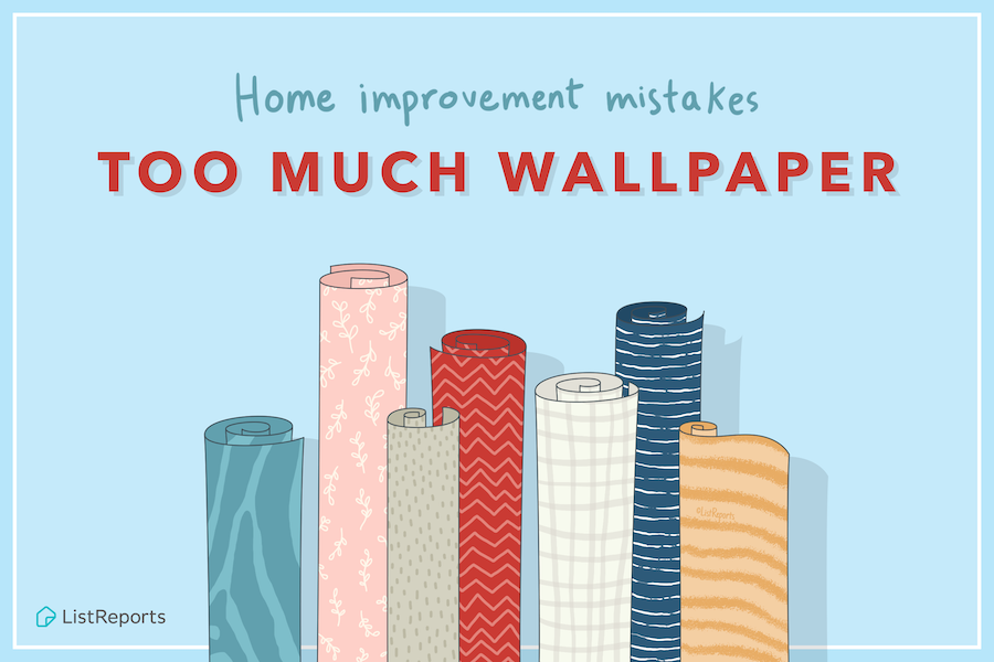 A bunch of rolls of wallpaper are stacked on top of each other on a blue background.