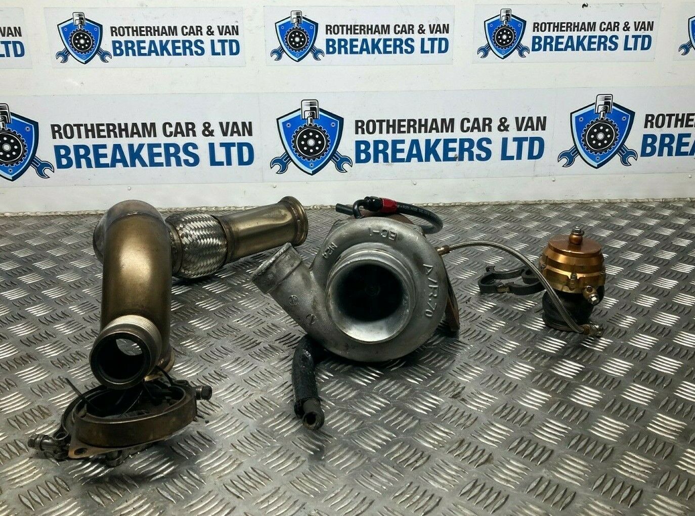 dismantled car parts on the display