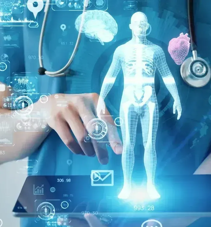 Doctor using digital tablet with holographic human skeleton, brain, and heart on screen.