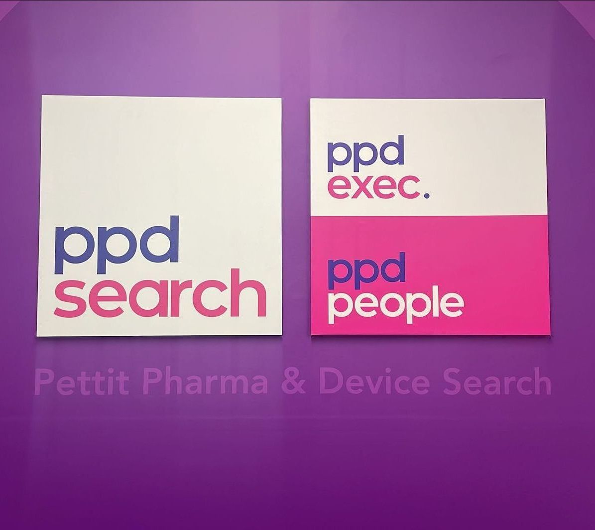 Two white square logos on a purple background.