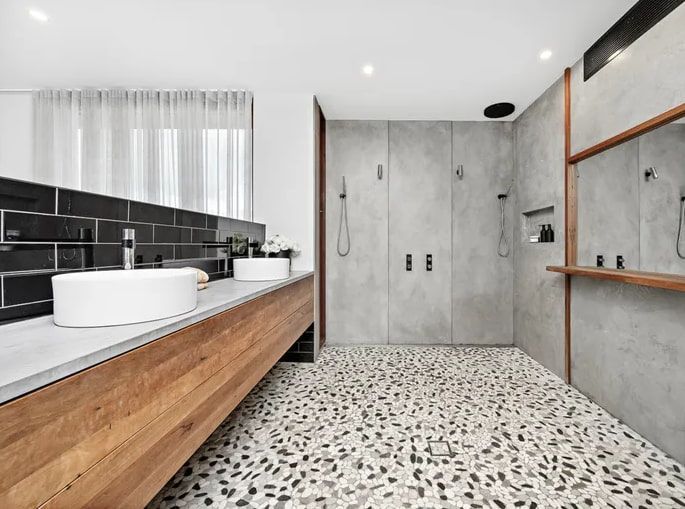 Bathroom with a Sink and a Mirror — Envisage Construction and Design in Woonona, NSW