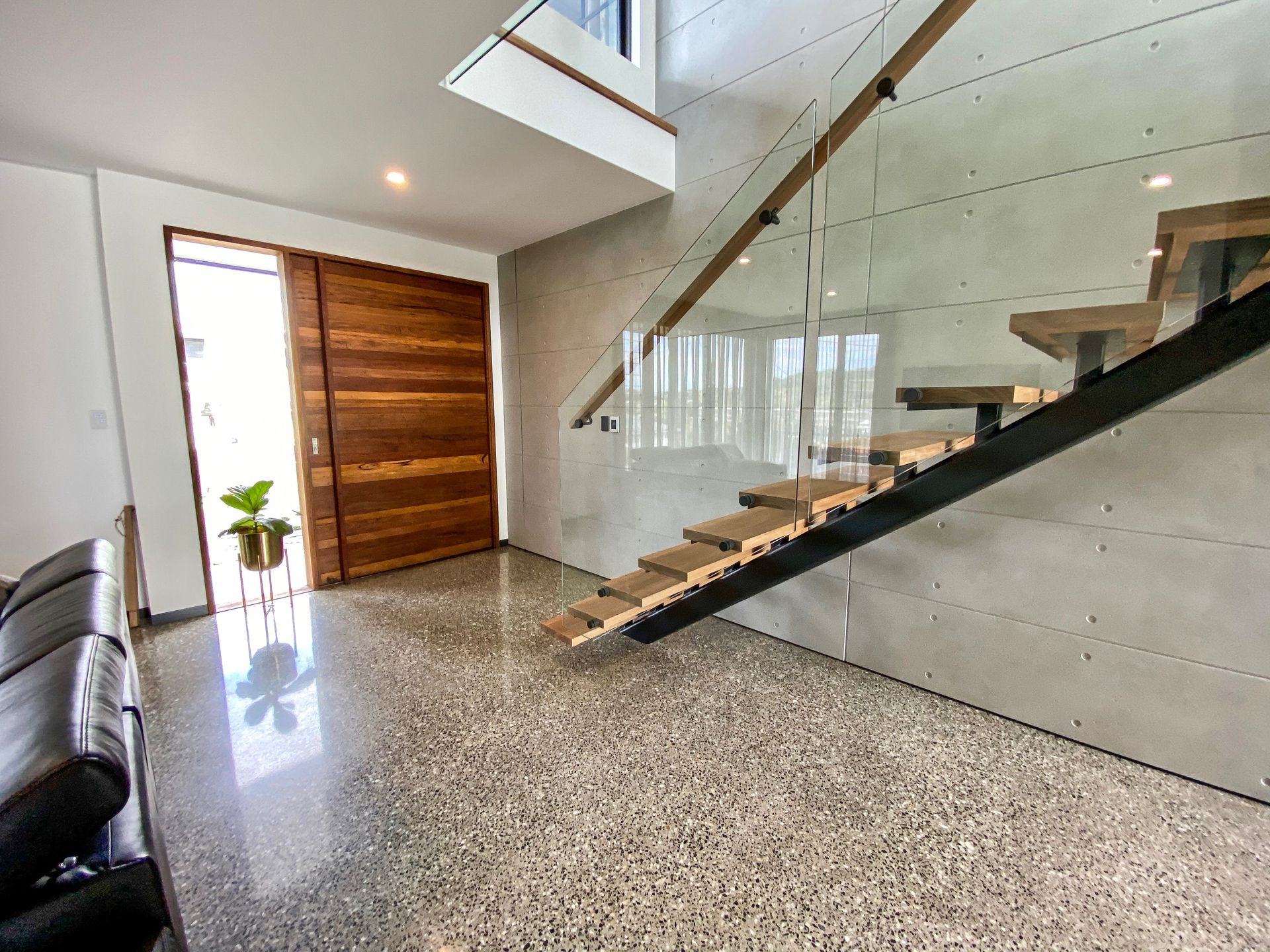 Kitchen With Grey Cinder Block Walls, Red Brick Counters — Envisage Construction and Design in Milton, NSW