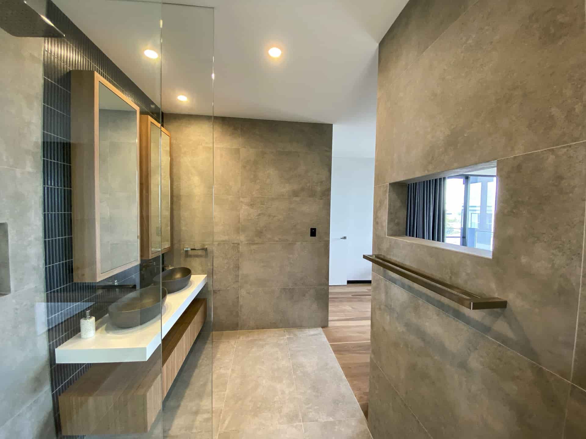 Modern Bathroom With Stone Walls — Envisage Construction and Design in Anzac Way, NSW