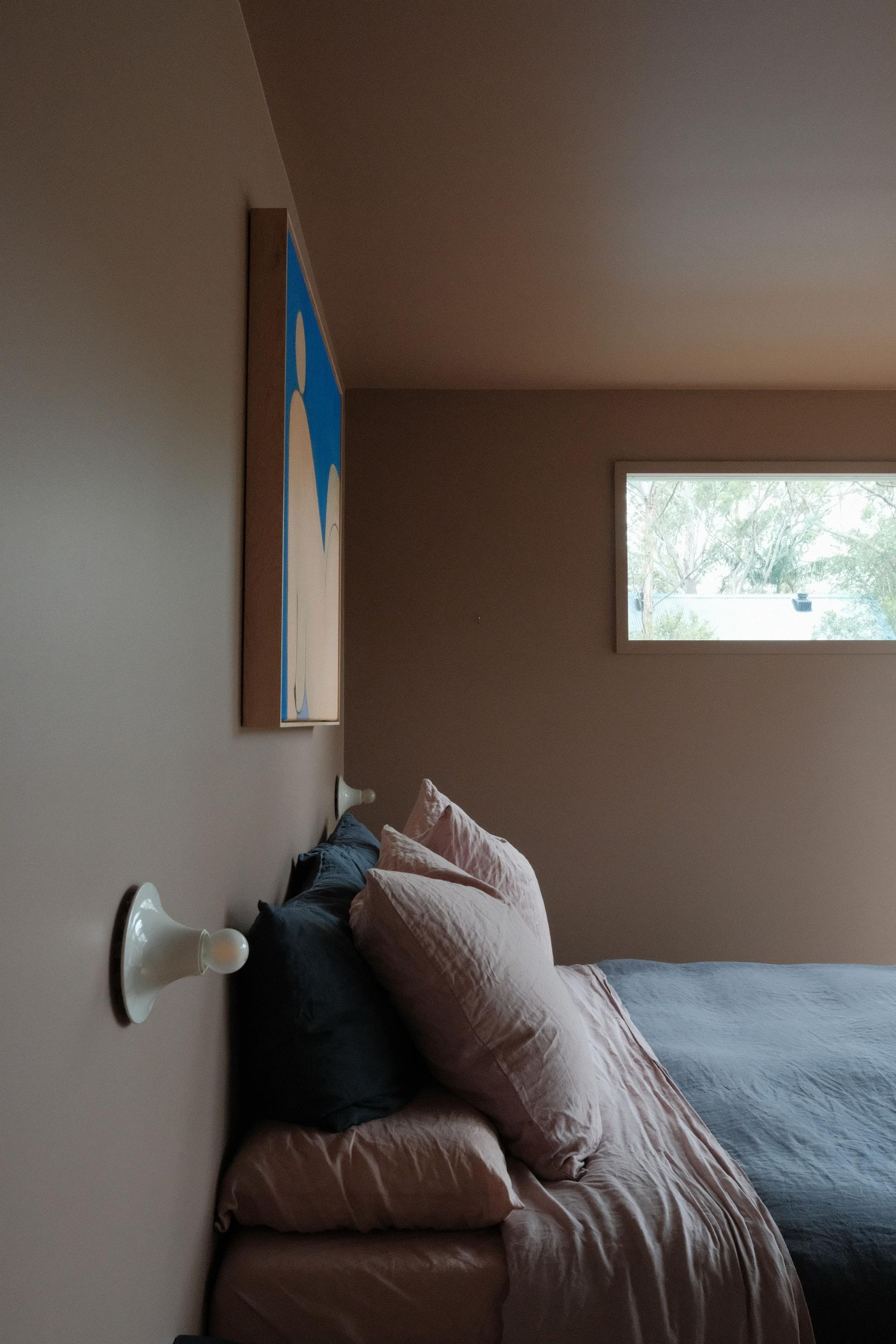 Room View with Pillows, Bed and Painting Frame — Envisage Construction and Design in Meadowbank, NSW