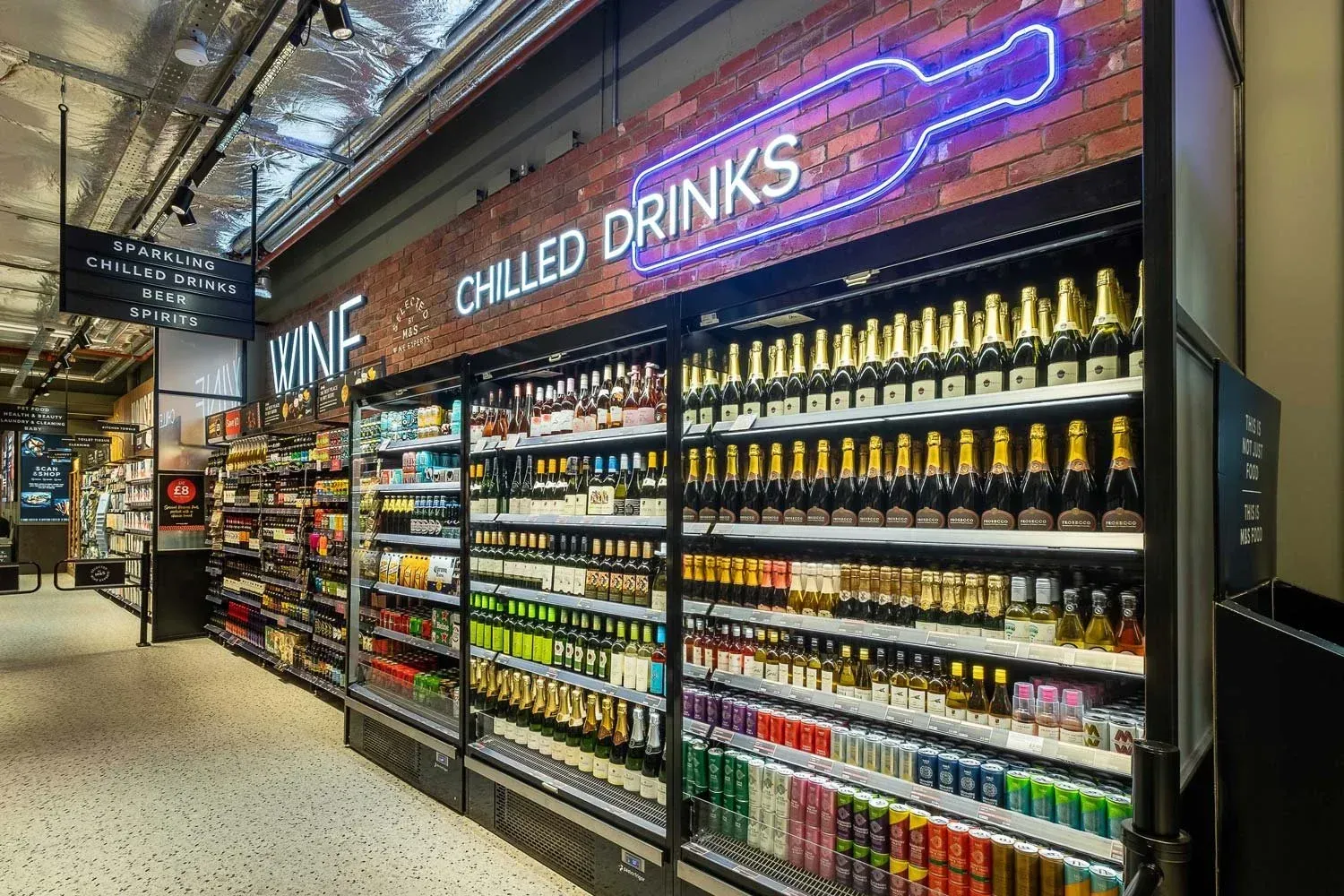 spring-loaded display unit showcasing premium canned cocktails
