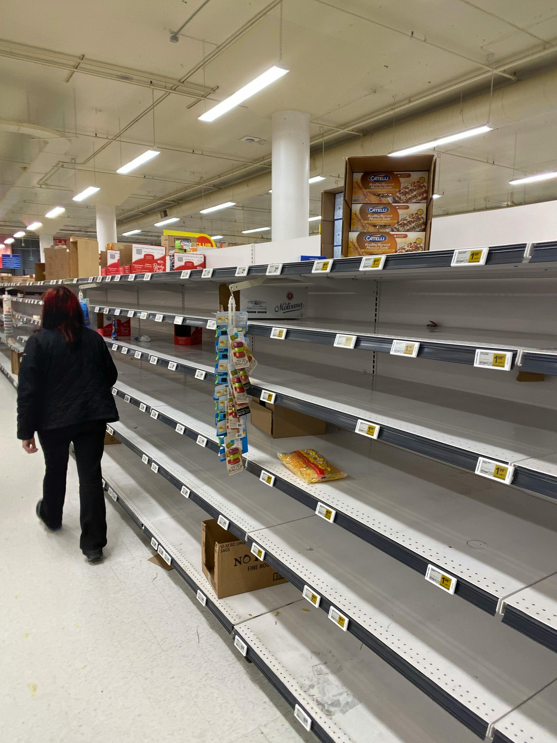 ertical Vendors spring-loaded retail display units vs traditional messy shelving.
