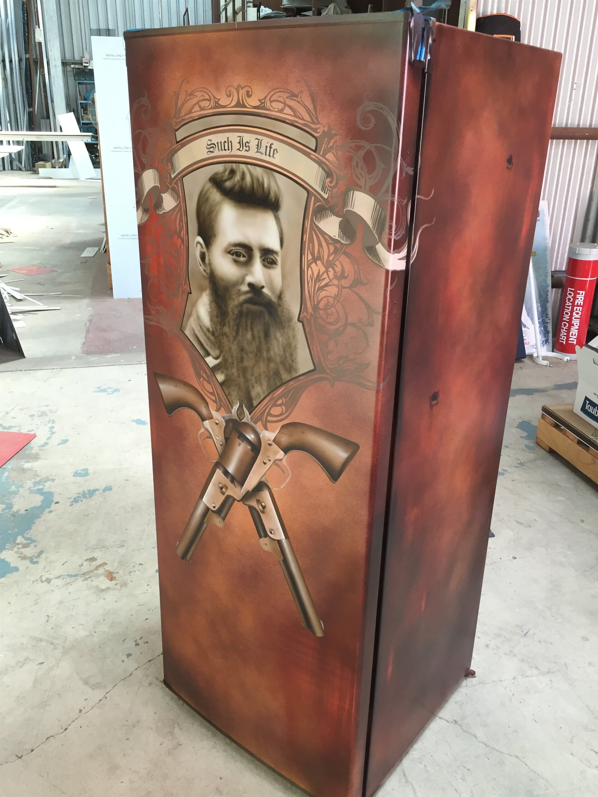 A Refrigerator With a Picture of a Man With a Beard on It — Bluey's Signs in Ciccone, NT