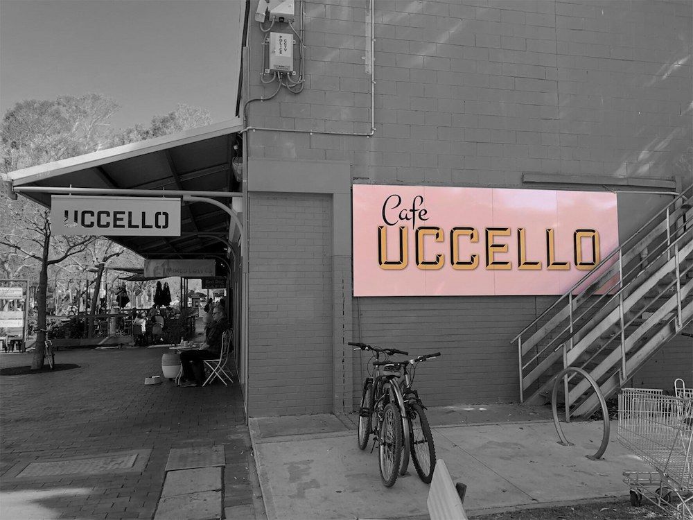 A Black and White Photo of the Cafe Uccello — Bluey's Signs in Ciccone, NT A Black and White Photo of the Cafe Uccello — Bluey's Signs in Ciccone, NT