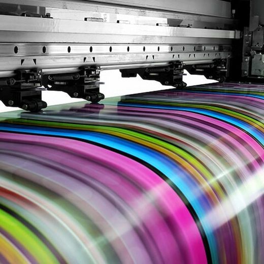 A Printing Machine is Printing a Colorful Sheet of Paper — Bluey's Signs in Ciccone, NT
