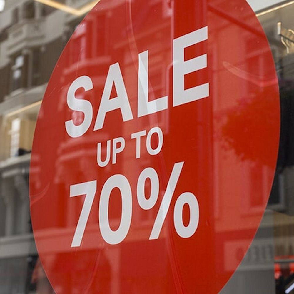 A Red Sign That Says Sale Up to 70 % on It — Bluey's Signs in Ciccone, NT A Red Sign That Says Sale Up to 70 % on It — Bluey's Signs in Ciccone, NT