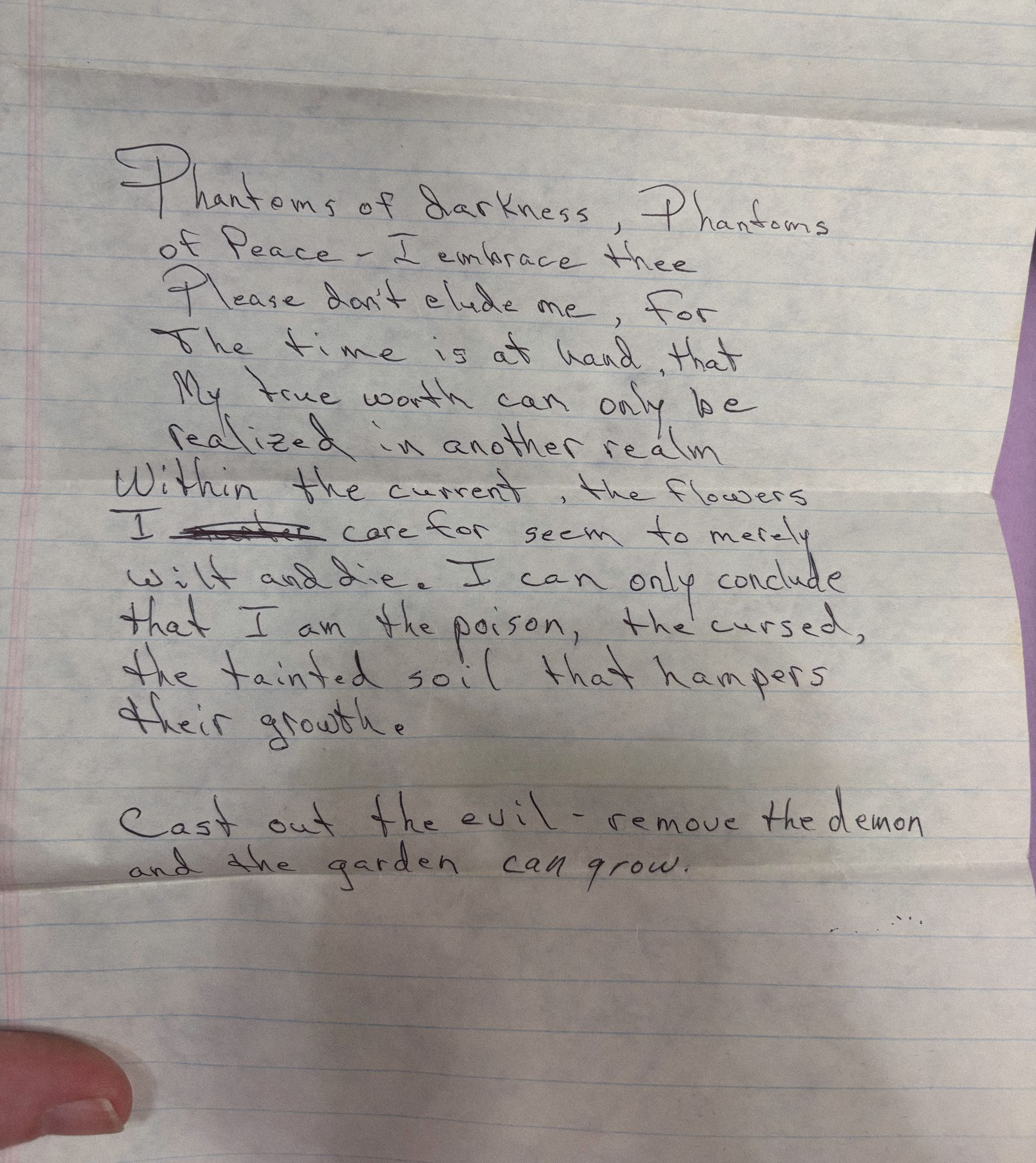 photograph of handwritten poem on notebook paper about darkness, Phantoms of darkness, Phantoms of Peace, feeling like poison, and inevitable growth through darkness, written in the 1990's by the father of Lauren Nixon-Matney author and creator of Searching for Stars a millennial's experimental multimedia memoir universe experience.