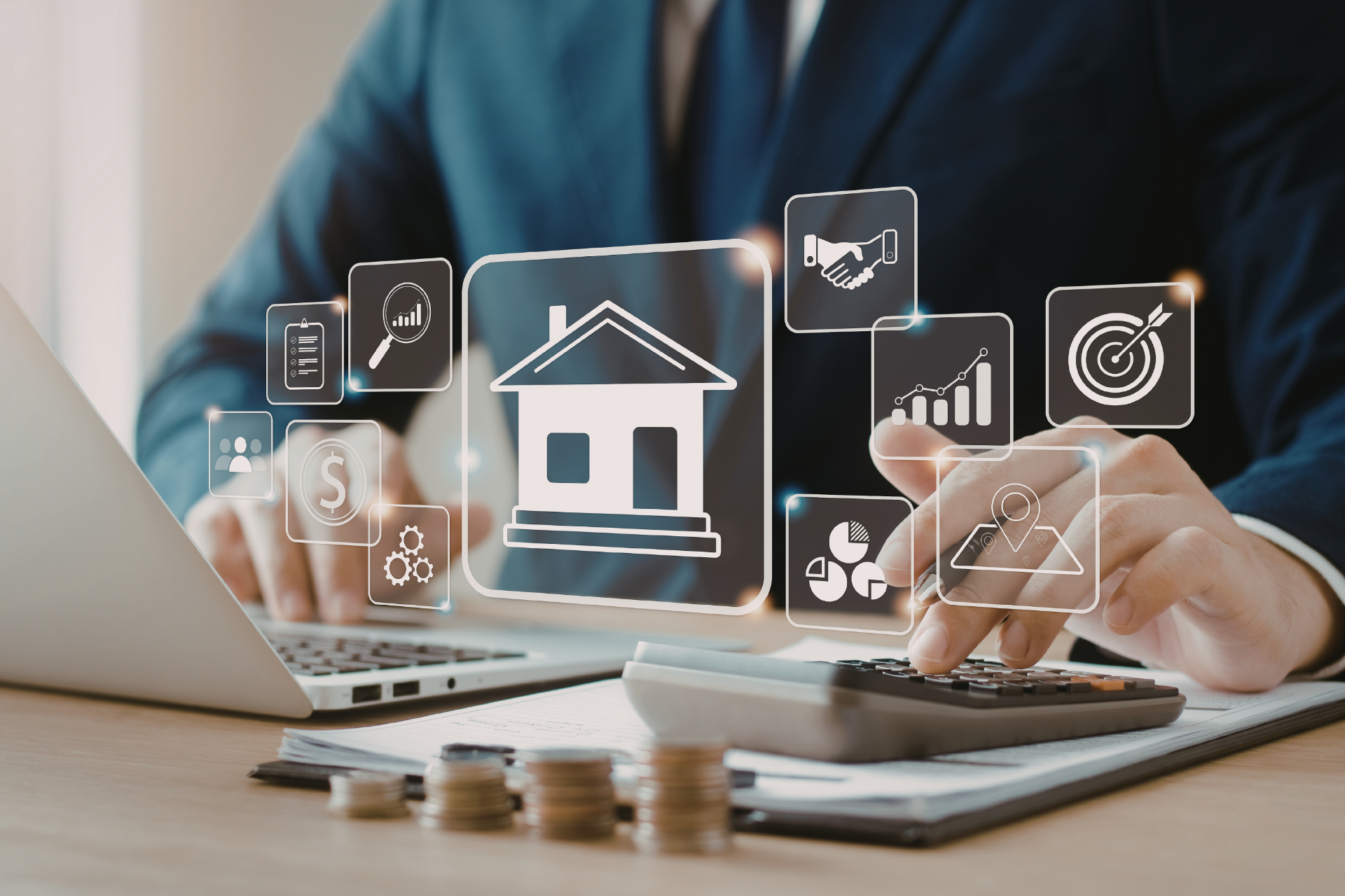 Hands typing on a laptop with a digital house icon and finance symbols overlaid on the screen