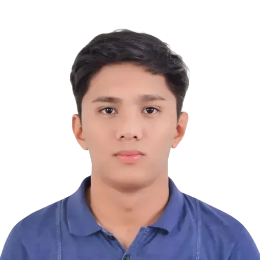 Kurt Manalastas with dark hair styled upward looking toward the camera against a plain white background.