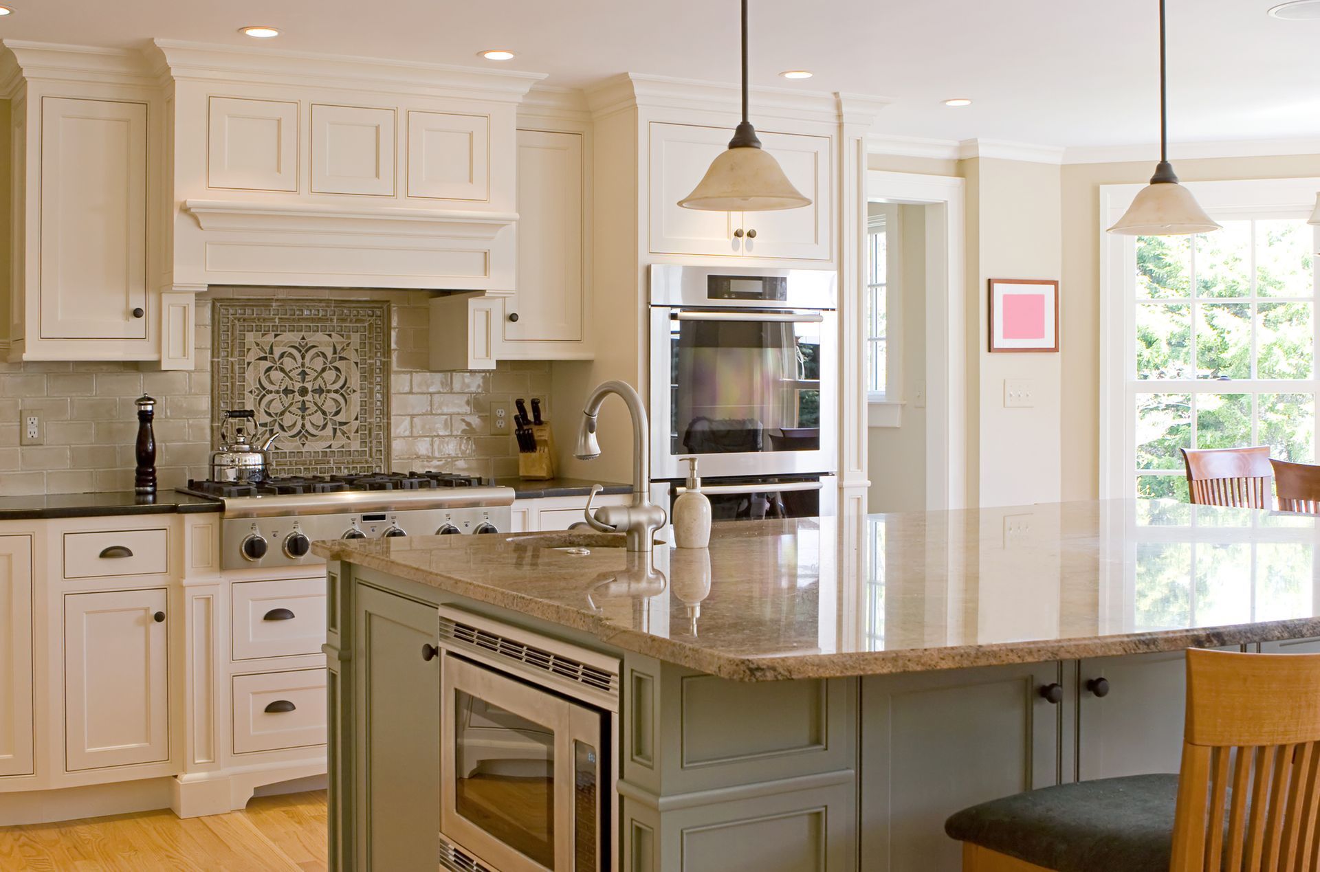 A wooden drawer is open in a kitchen