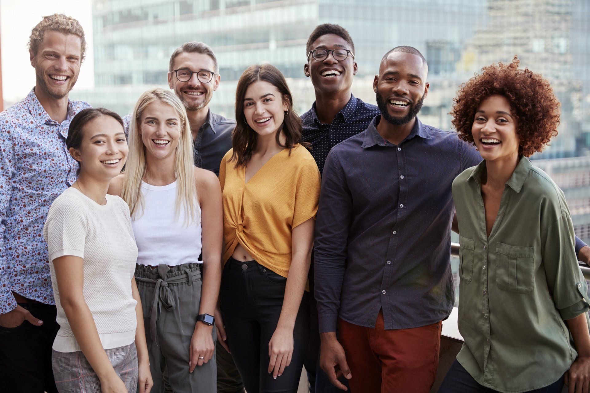 Group portrait of a creative business team standing outdoors