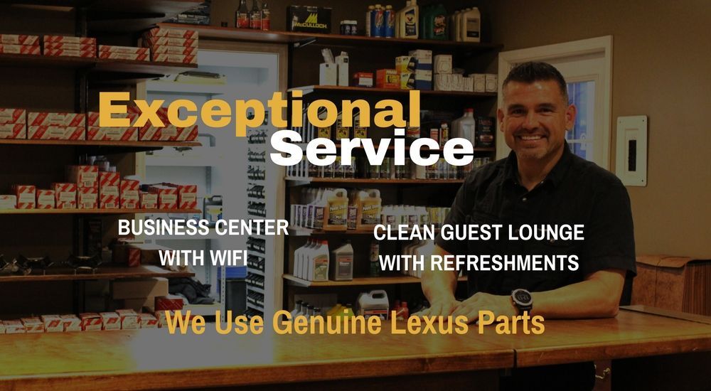 Shop's team member at their reception desk | Luxury Motorworks