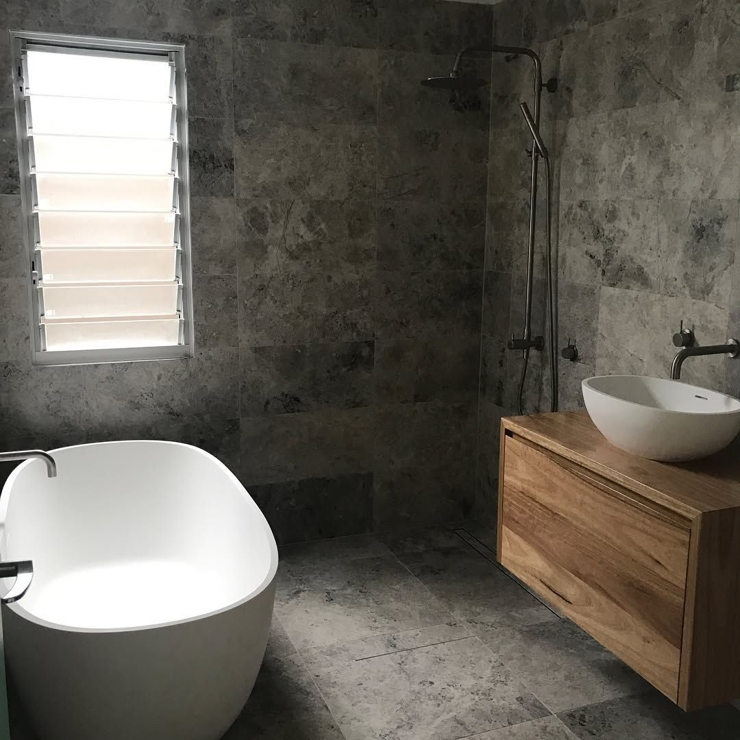 A Bathroom With a Bathtub , Sink and Shower — Dean Gray Tiling in Tweed Heads, NSW