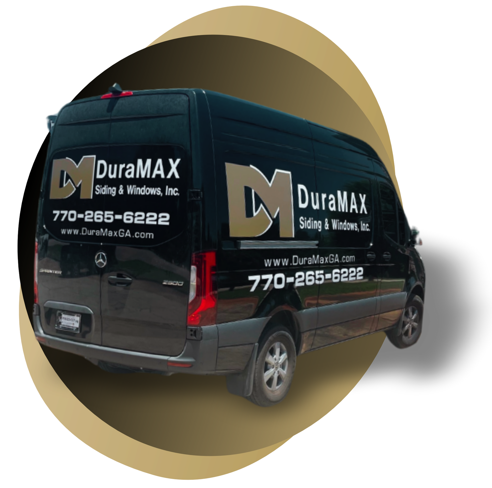 DuraMAX van with black wrap and gold logo on a beige circular background