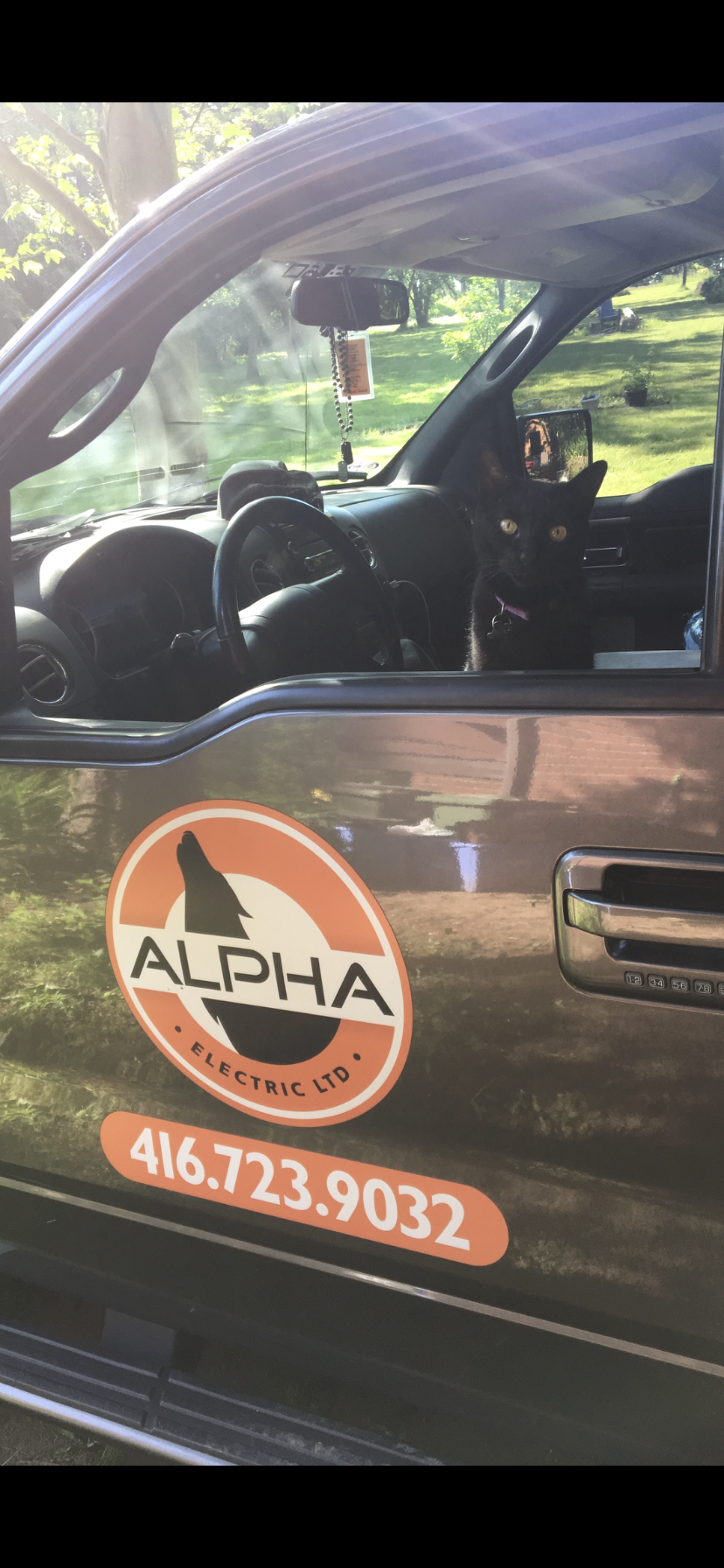A truck with the word alpha on the side of it.