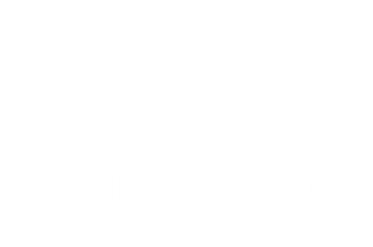 Un logotipo con un monograma azul estilizado que presenta las letras T y P entrelazadas sobre un fondo blanco.