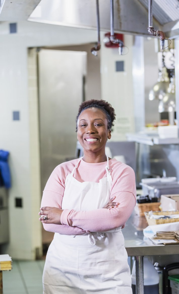 women in school kitchen