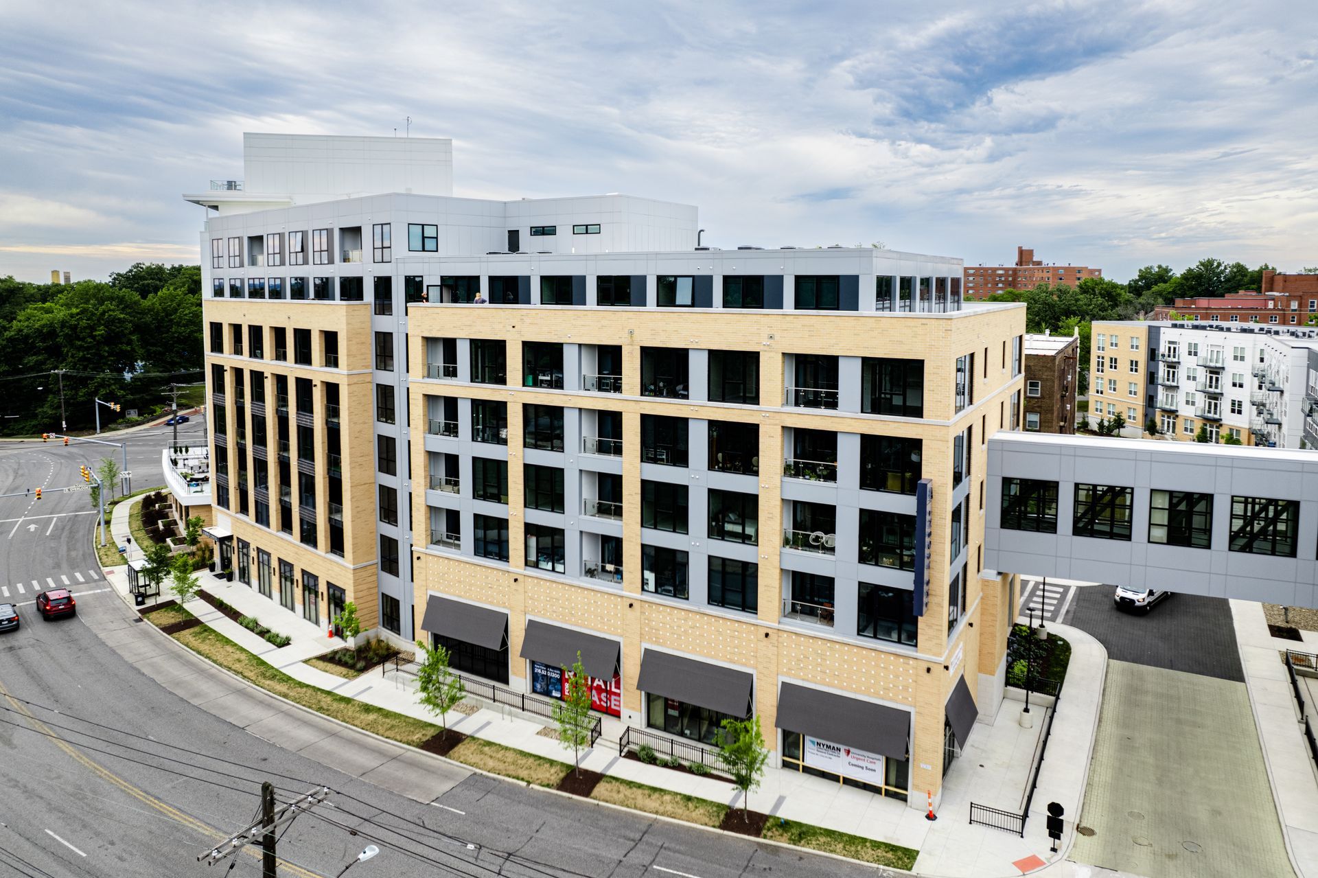 An aerial view of a large building with the word identity on the top.