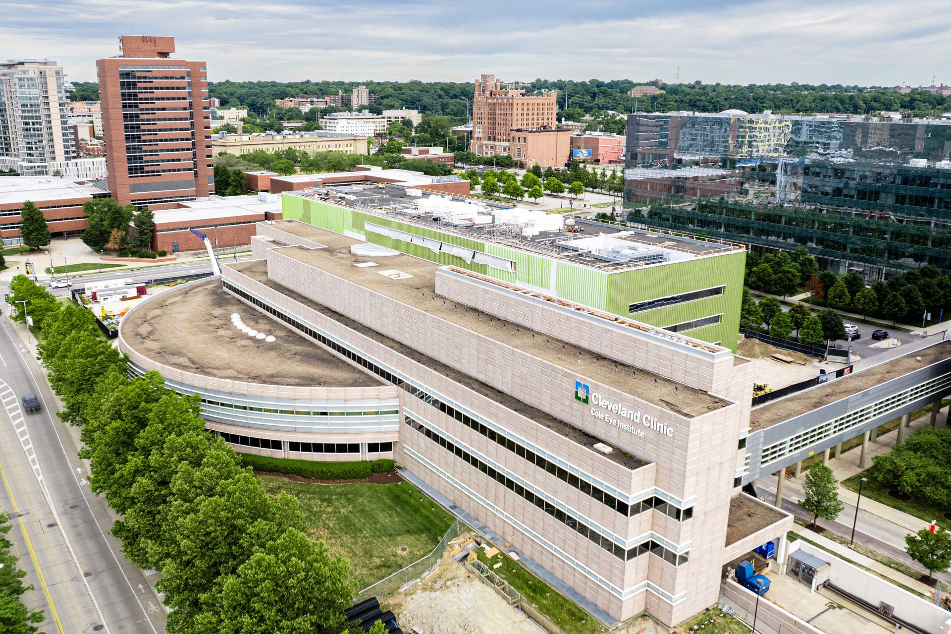 An aerial view of a large building in a city.