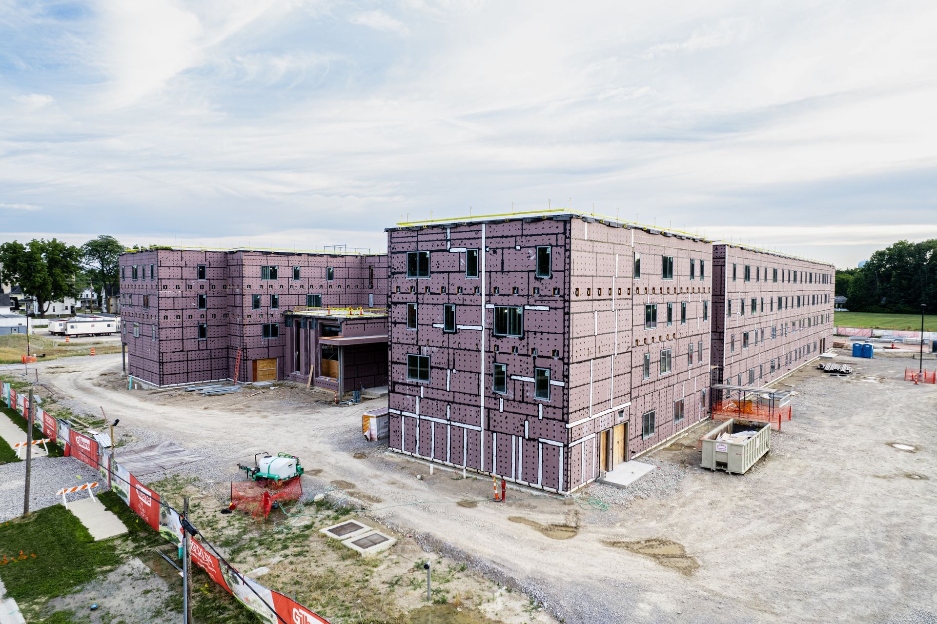 An aerial view of a large building under construction.