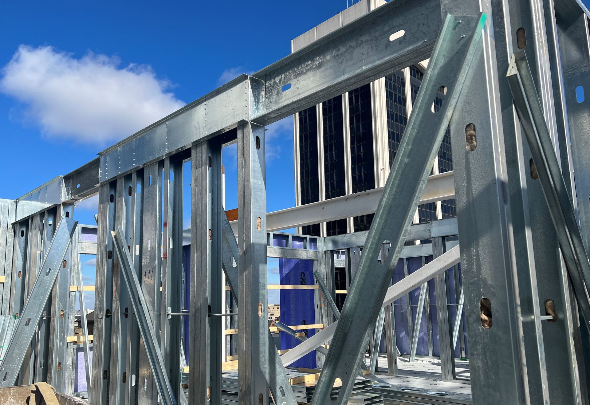 A building is being built with a lot of metal beams.