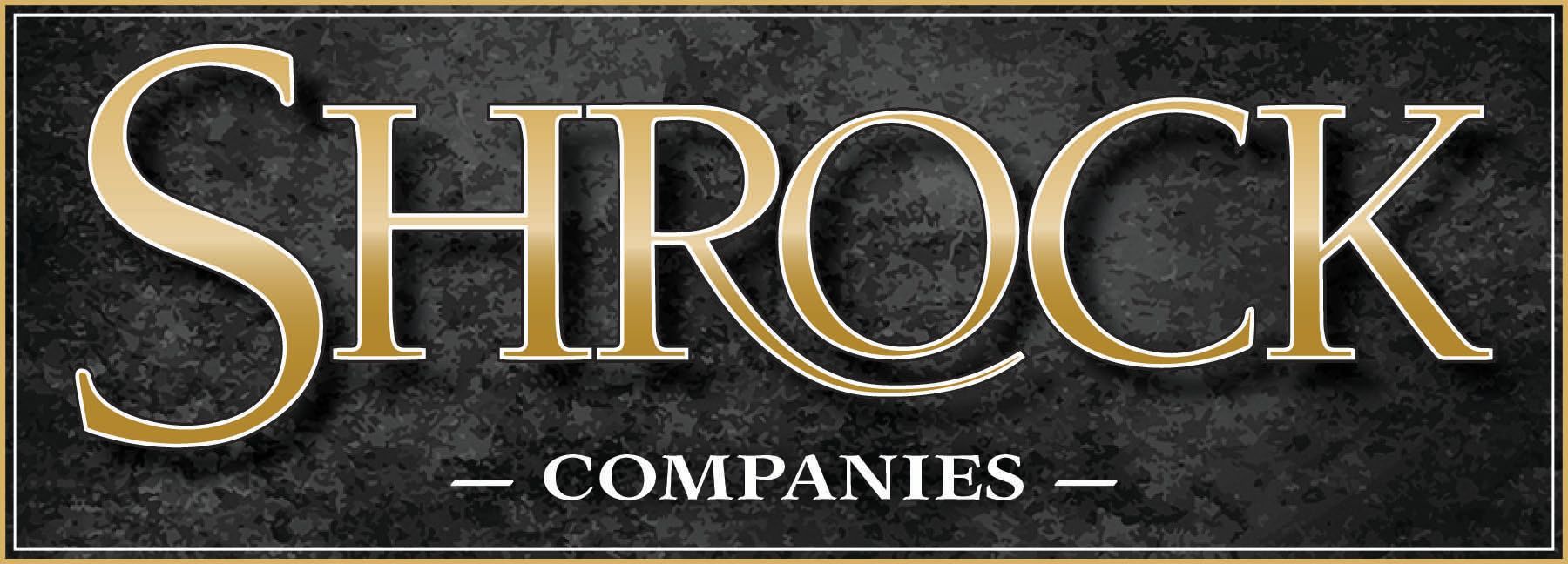 The Shrock Family of Companies logo.