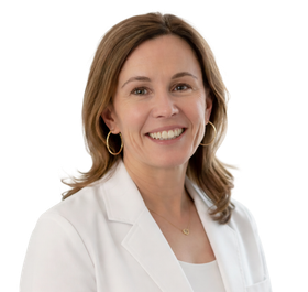 Smiling professional in a white blazer on a plain white background