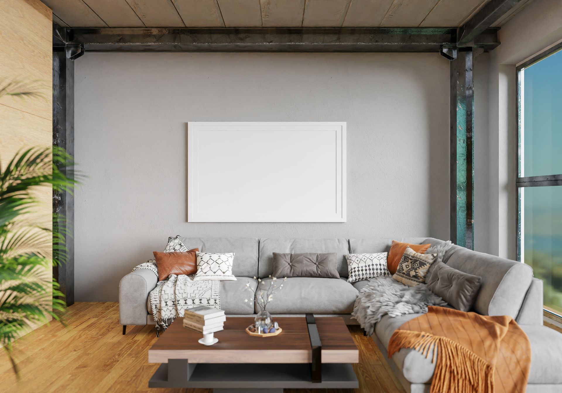 A living room with a couch , coffee table , and a large picture on the wall.