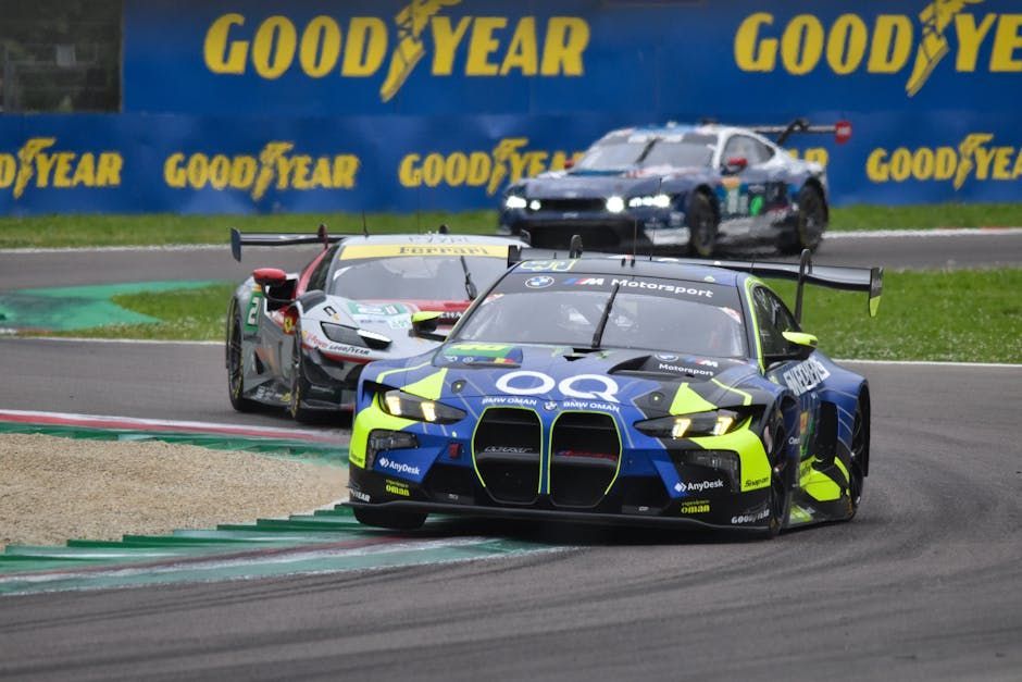 gt cars racing at a track with a BMW GT4 car