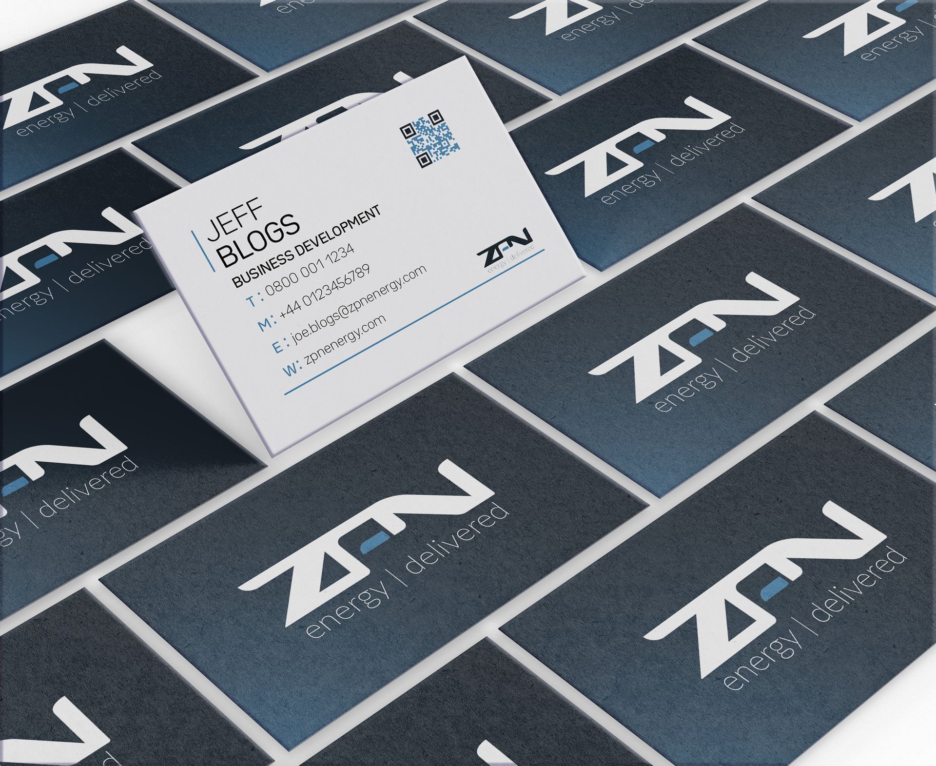 A stack of ZPN business cards with the letters zn on them