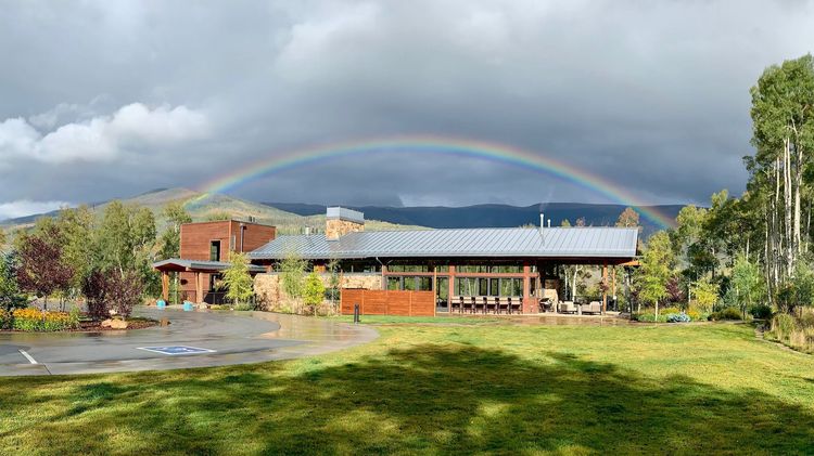 Aspen House Clubhouse with a rainbow