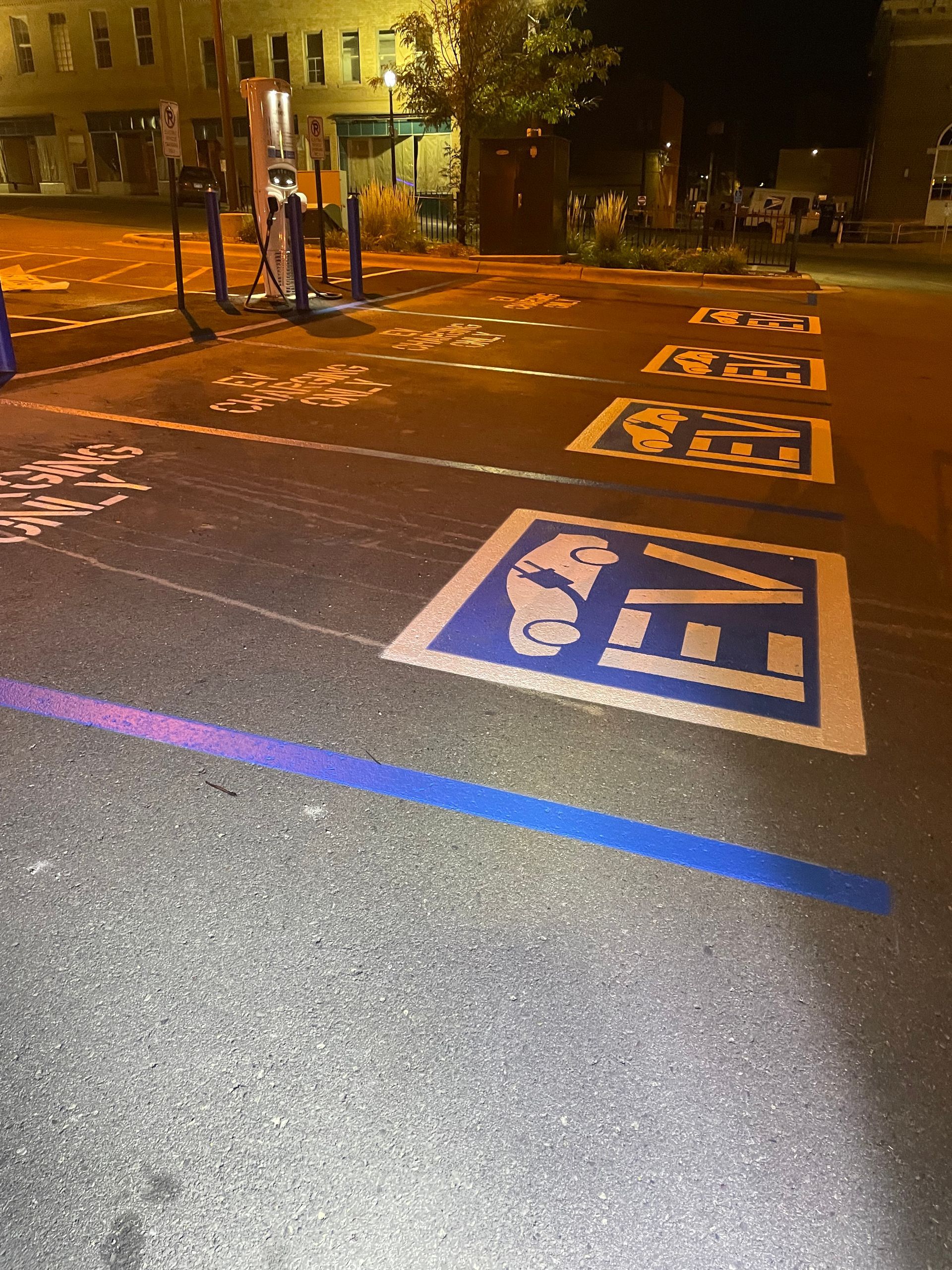 A Parking Lot with A Handicapped Sign Painted on It | Owatonna, MN | Seykora Striping