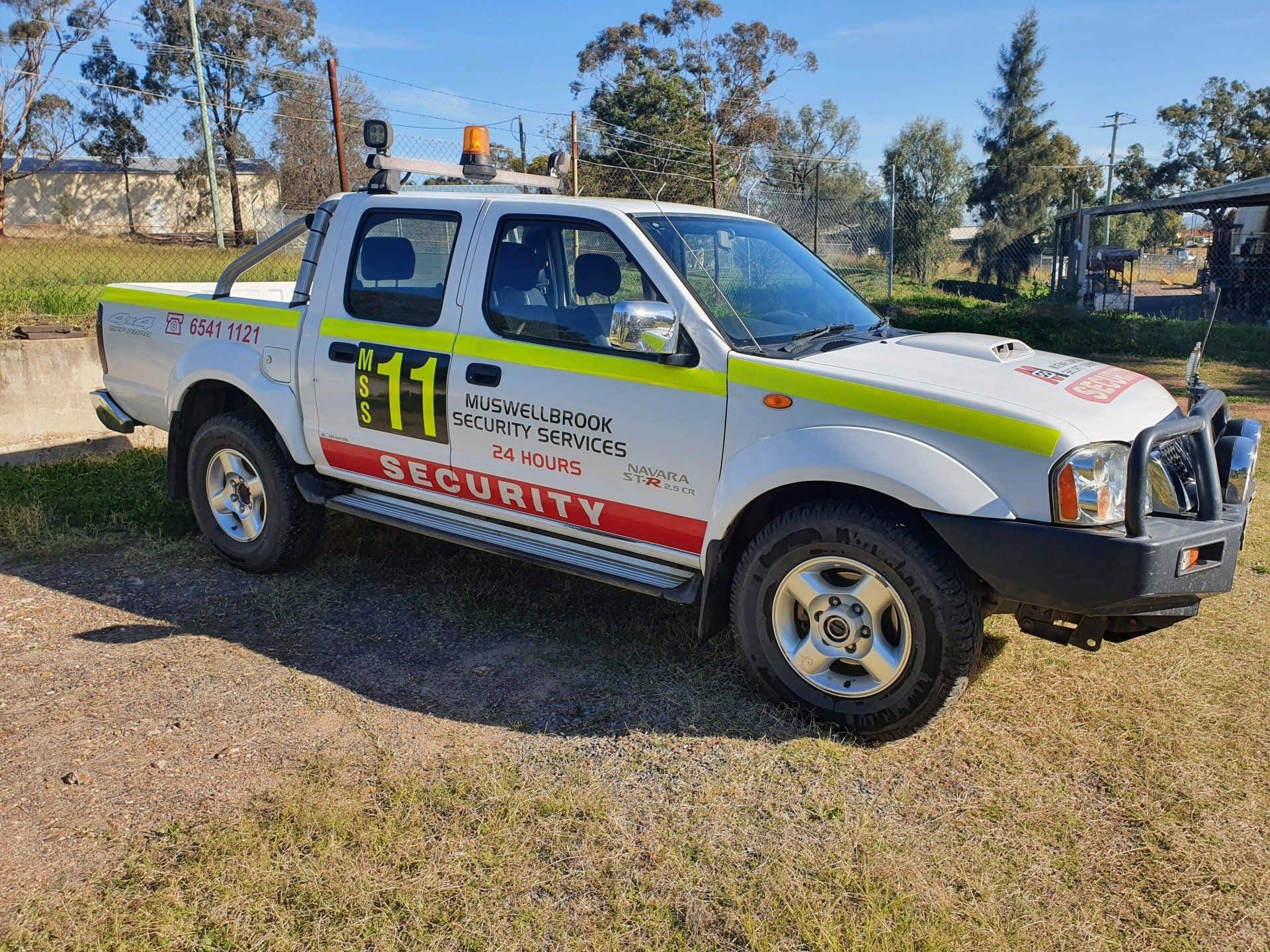 Security Man Standing Indoor — Security Guard Hire in Muswellbrook, NSW